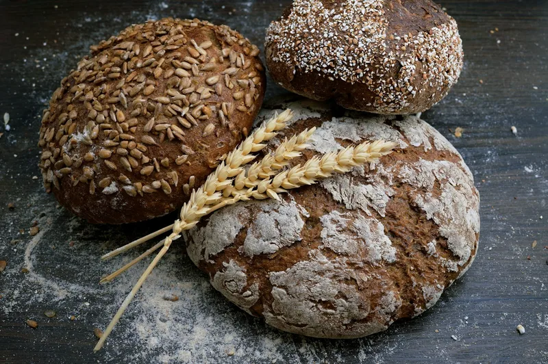 Loaves of sourdough bread on a wooden board
