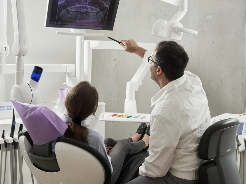 A dentist with a patient