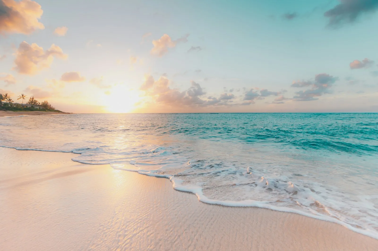 An empty beach at sunset