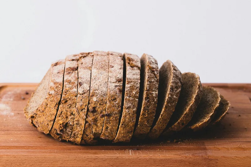 A sliced seeded rye loaf